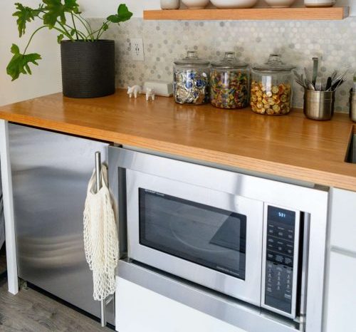 can you warm raw dog food in microwave